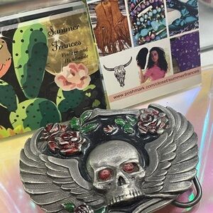 Skull and Wings Belt Buckle with Red and Silver Accents